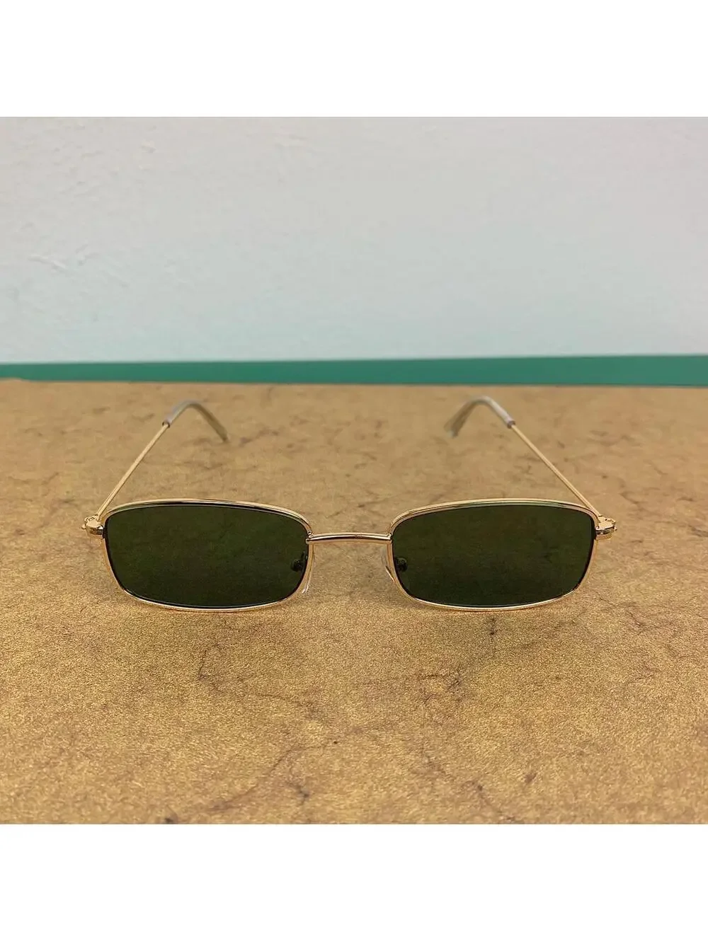 Y2k 2000s vintage green and gold unique slim style sunglasses. Gold trim with